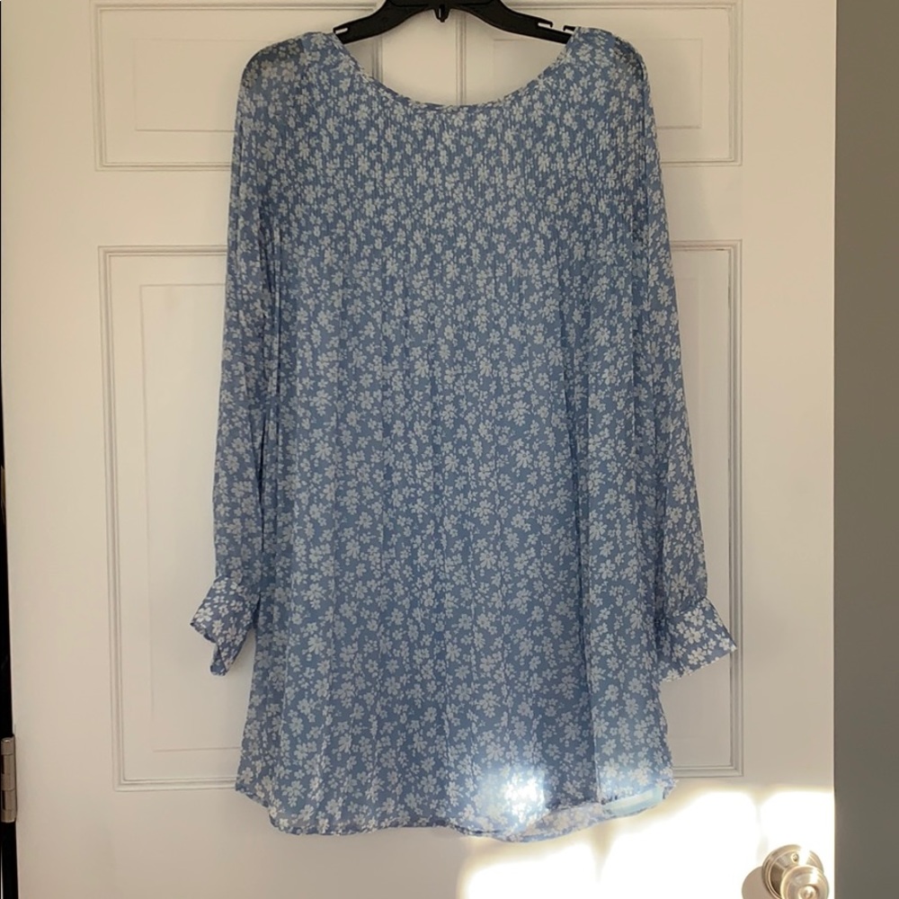 Beautiful light blue flowery blouse never worn